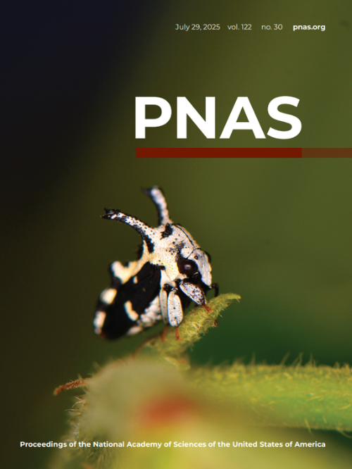 Front cover of journal, PNAS, showing treehopper on a leaf